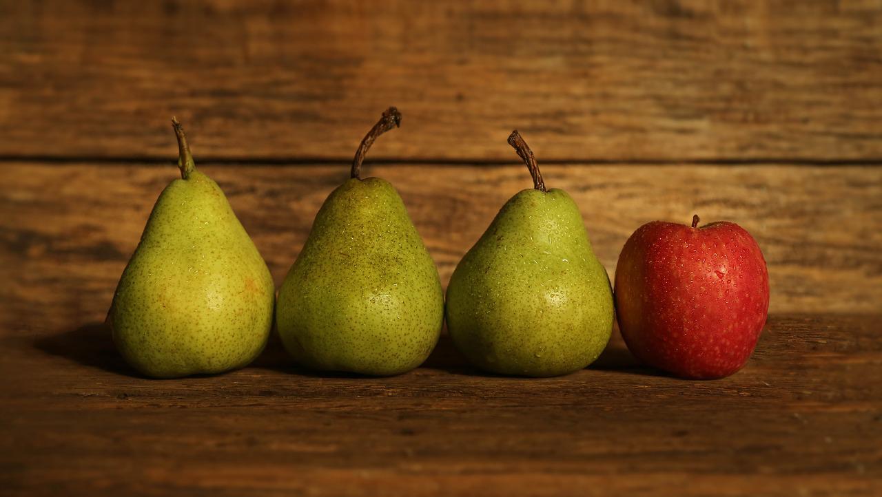 Three identical green pairs and a red apple
